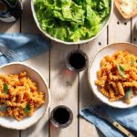 Pesto alla trapanese with fusilli and Italian salad